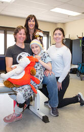 Dr. Nicole Culos-Reed and Emma McLaughlin with family who took part in exercise program