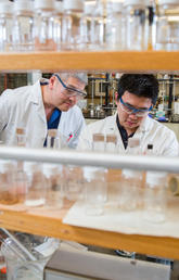 University of Calgary Chemistry professor George Shimizu, left, will lead the CREATE Training Program in Carbon Capture with the focus on training students such as grad student Roger Mah, right.