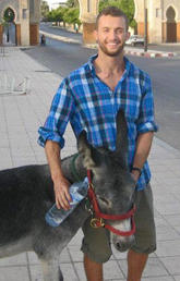 Mooshkeil the donkey and Scott Zaari became fast friends during his summer spent volunteering.