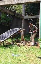 Duncan Lucas tests a solar panel and a water pump at the Bahir Dar Institute of Technology.