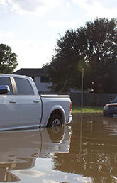Cars in flooded street