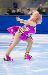 A drag queen skates at the olympic oval