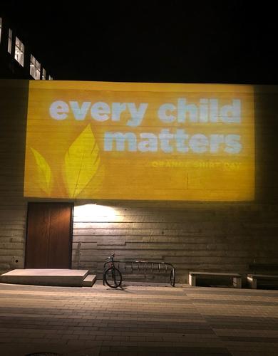 The Every Child Matters night light tribute outside the Taylor Family Digital Library at UCalgary