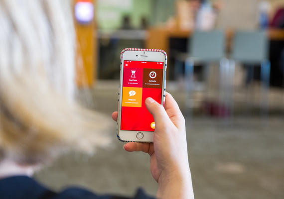 A phone displaying the UC Emergency Mobile App