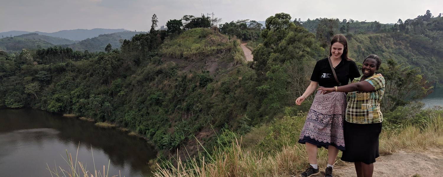 2 people standing on the hill with a view - Uganda