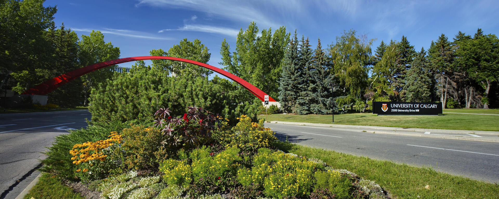 exterior picture of red arch at UCalgary campus