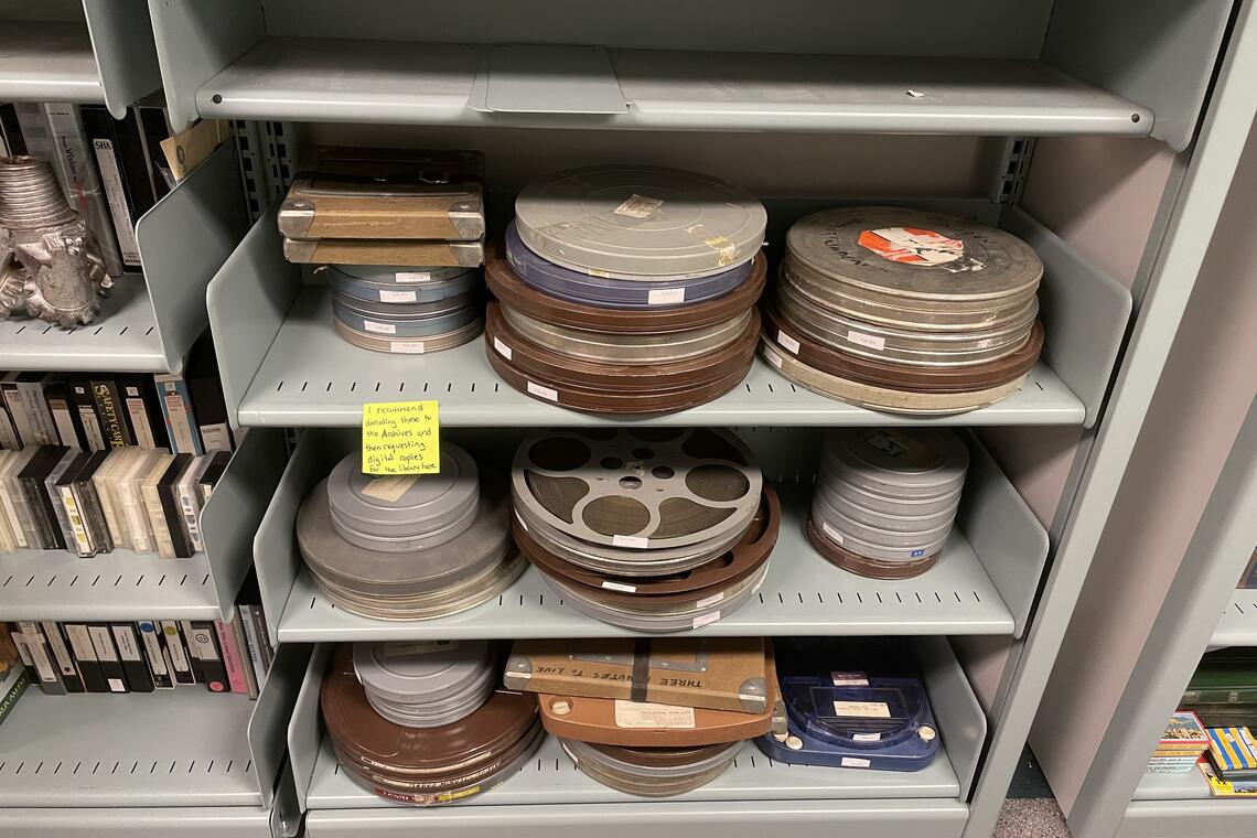 movie reels on a shelf