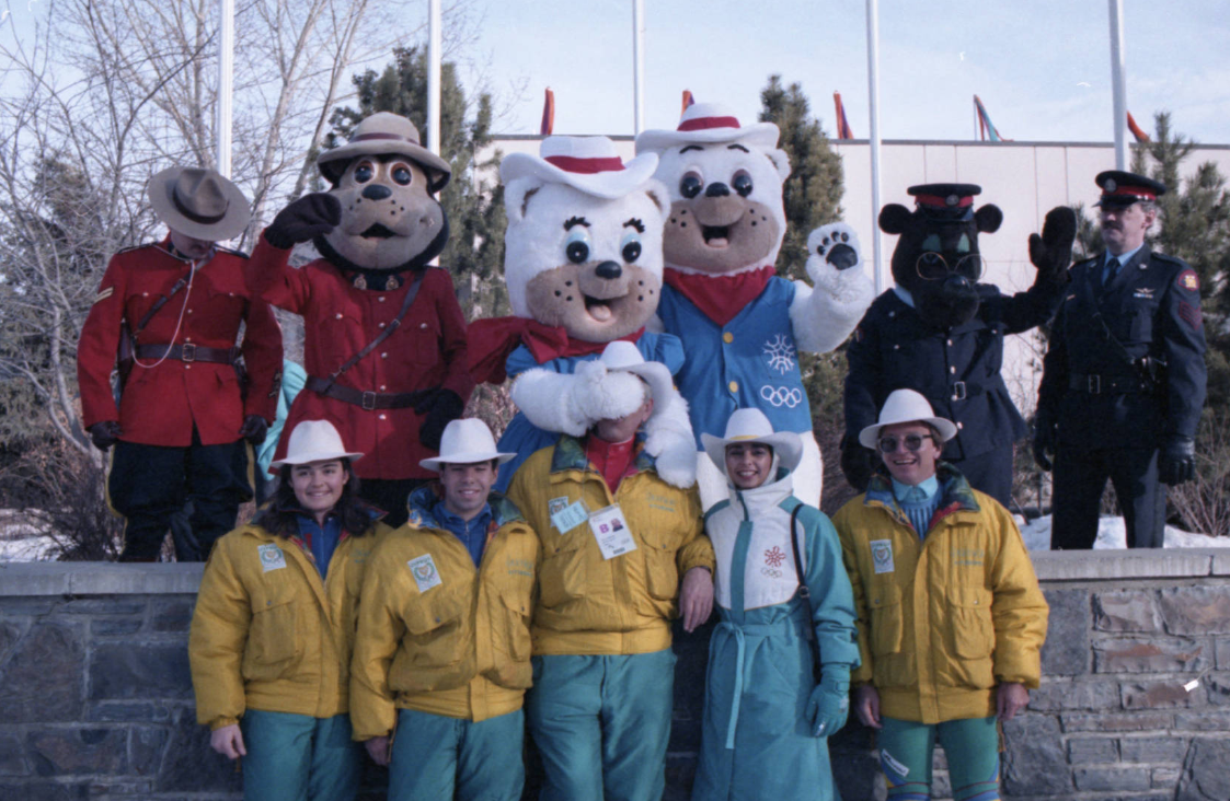 Image of Cypriot Olympic athletes with the 1988 Calgary Winter Olympic mascots Hidy and Howdy during the official ceremony to welcome athletes to the Olympic Village at the University of Calgary. Image of Cypriot Olympic athletes with the 1988 Calgary Winter Olympic mascots Hidy and Howdy during the official ceremony to welcome athletes to the Olympic Village at the University of Calgary.