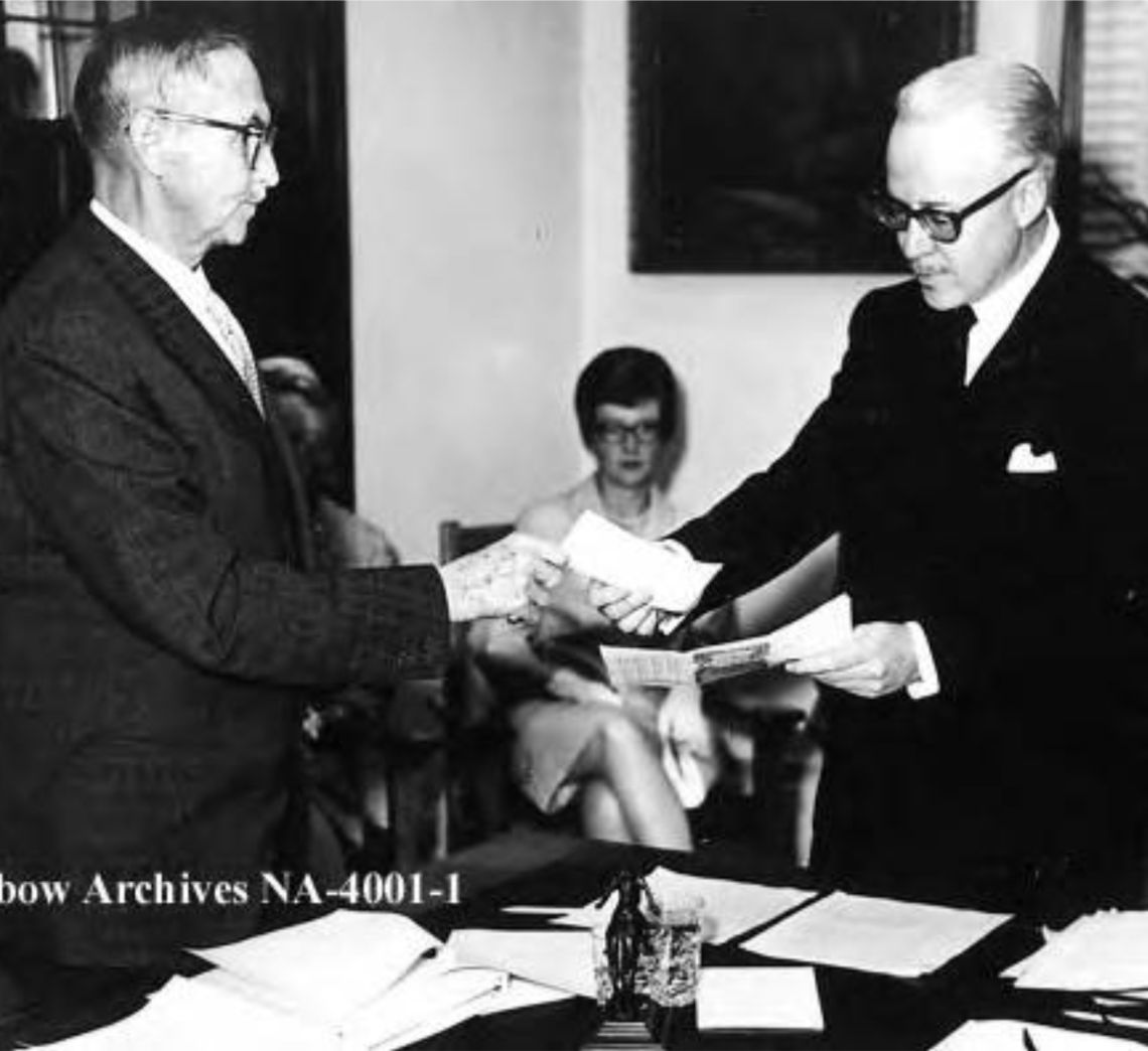 First meeting of new Glenbow Museum organization, took place in old Courthouse on 7th Avenue SW. Eric Harvie, left, handing cheque for $5,000,000 to Honourable Mr. Justice N.D. McDermid, first chairman of the Board of Glenbow governors. First meeting of new Glenbow Museum organization, took place in old Courthouse on 7th Avenue SW. Eric Harvie, left, handing cheque for $5,000,000 to Honourable Mr. Justice N.D. McDermid, first chairman of the Board of Glenbow governors.