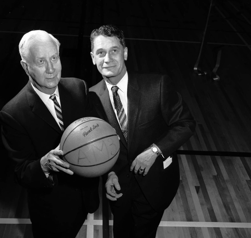 Image of the Hon. J. Percy Page, lieutenant-governor of Alberta with University of Alberta, Calgary head of physical education Lou Goodwin during the official opening of the university's $1.6 million gymnasium building.