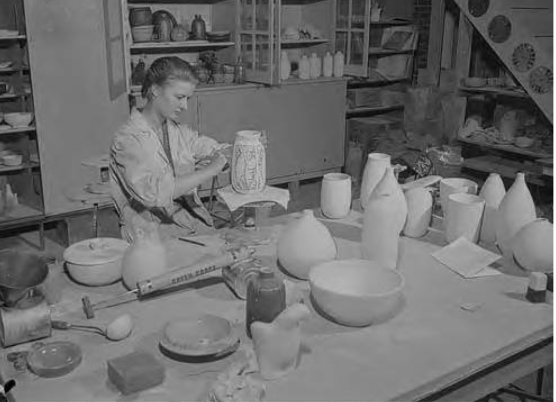 Sophie Sembaliuk works on a vase.