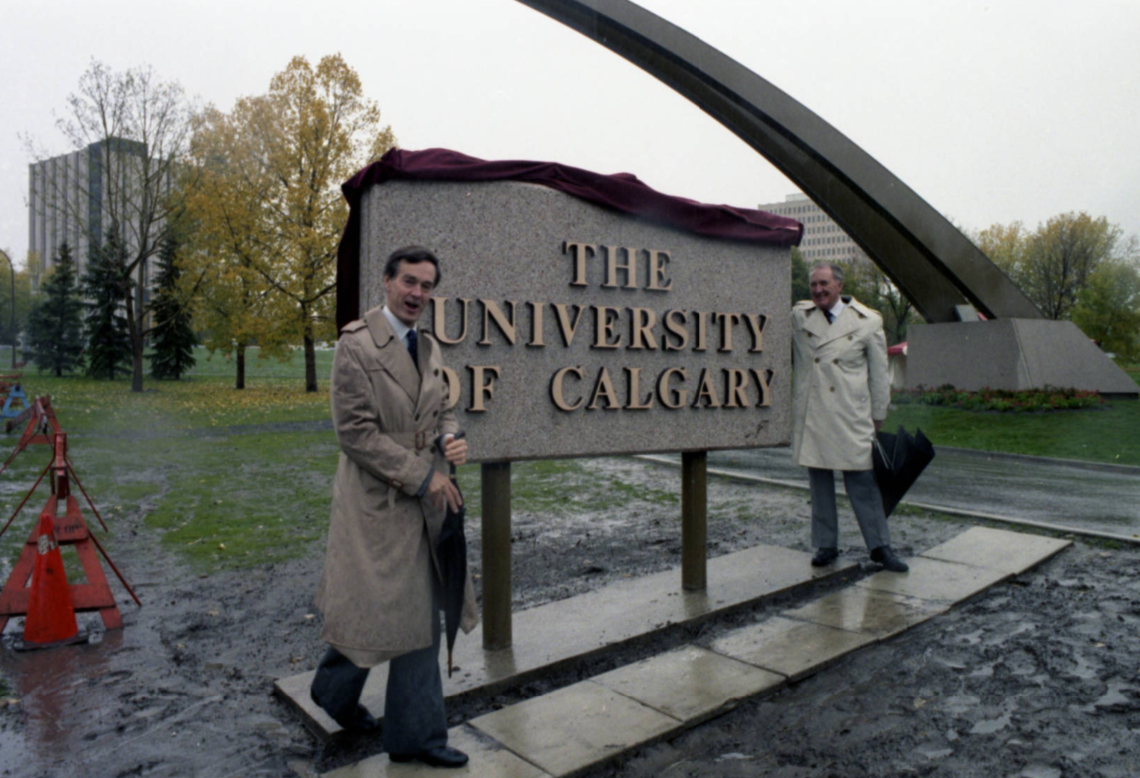Image of the official ceremony for the unveiling of the University of Calgary entrance arch and sign at the junction of University Drive and 24th Avenue. Image of the official ceremony for the unveiling of the University of Calgary entrance arch and sign at the junction of University Drive and 24th Avenue.