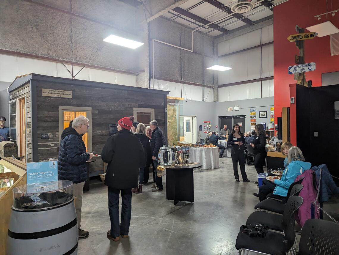 people attending an exhibit launch at the Canadian Energy Museum