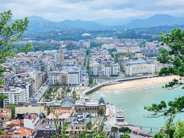 From a hill overlooking a Spanish town by the ocean.