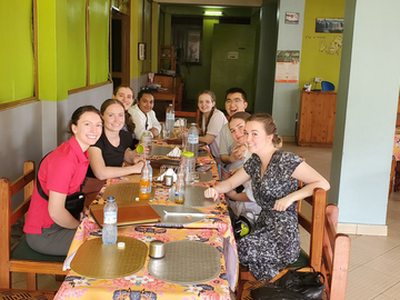 UCalgary students eat together in a dining hall