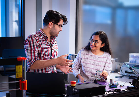Two students in a lab