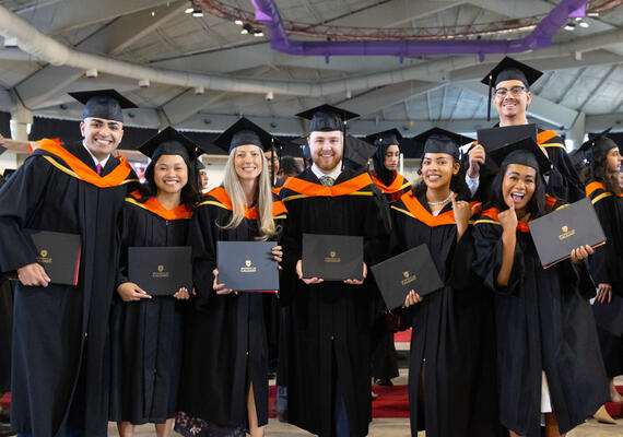 Engineering students in convocation robes and caps