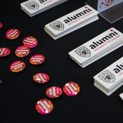 Button pins and stickers displayed on a table