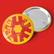 A button pin with a colourful spark graphic