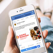 Phone showing a social media post promoting the report