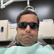 Individual taking a selfie at the dentist