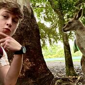 Student posing with kangaroo