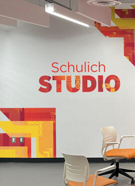 A meeting room with colourful wall graphics