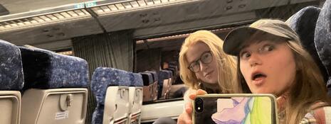 Selfie of students having fun on a train