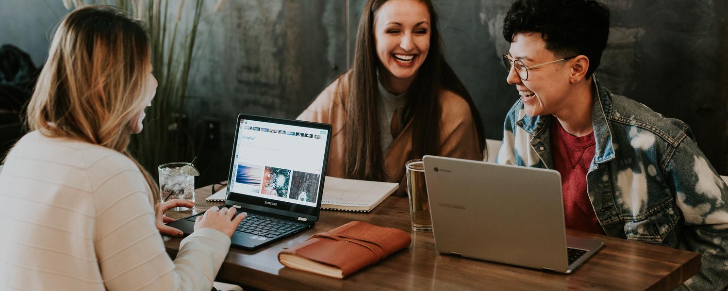 Students laughing and working
