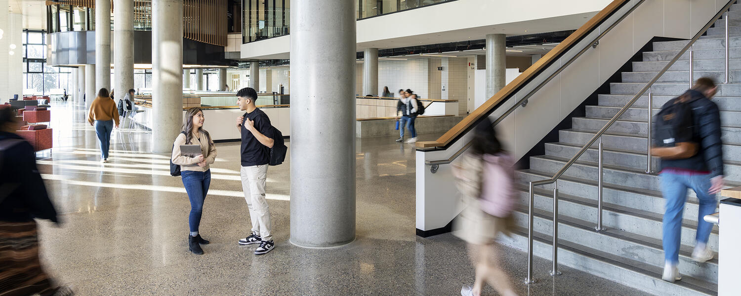 Students walking though a large atrium