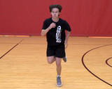 Athlete performing compass jumps with single-leg landing exercise