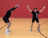 Athletes performing the Y component of the IYTW exercise