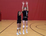 Athlete performing partner nudge upon landing exercise