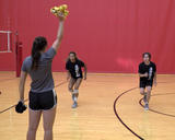 Athletes performing coach-directed version of the shuttle run from push-up exercise