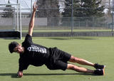 Athlete performing a side plank