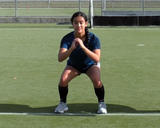 Athlete performing a squat hold