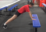 Athlete performing incline push-ups