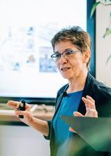 Rei speaking at the event