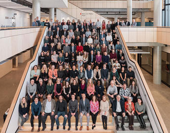 mathison hall and staff on staircase