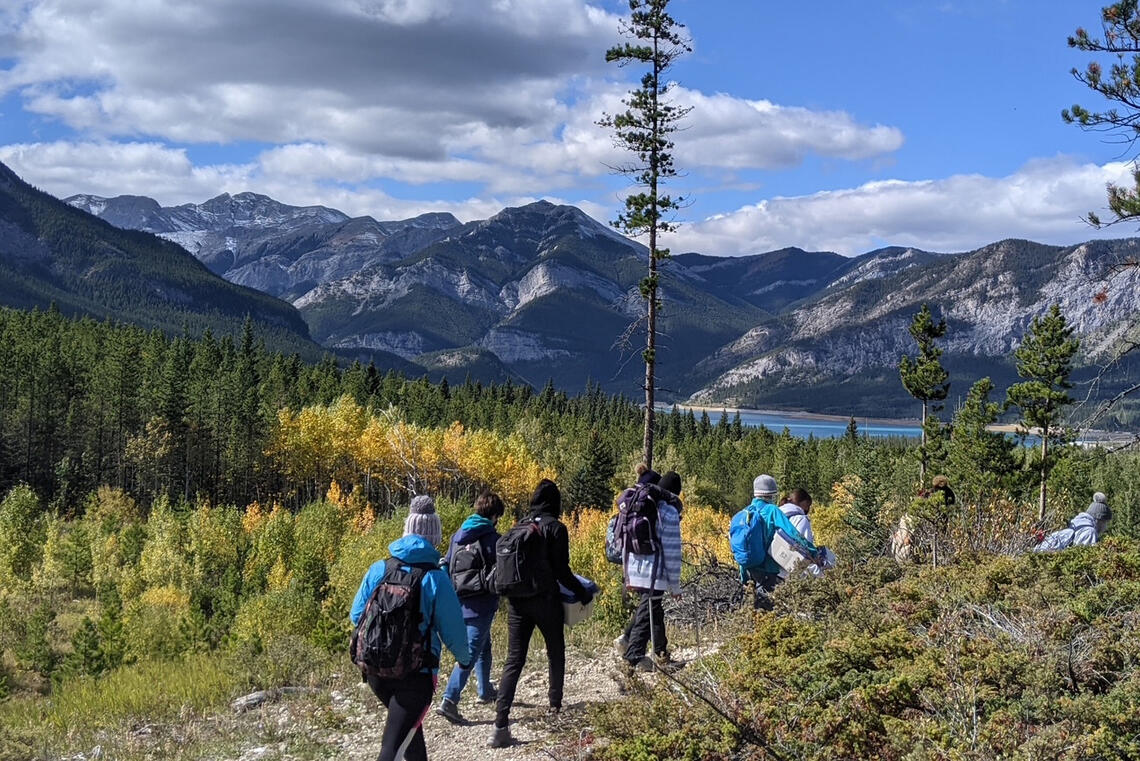A group of people on a walking trail