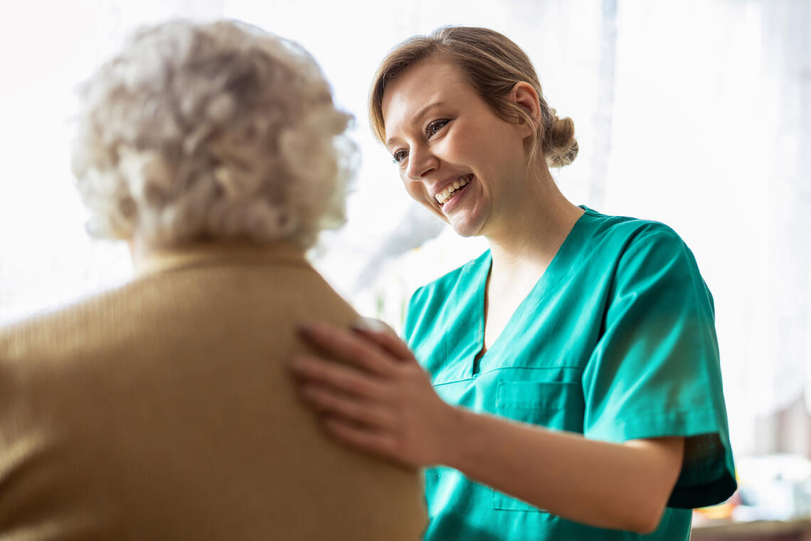 A nurse talks to a patient