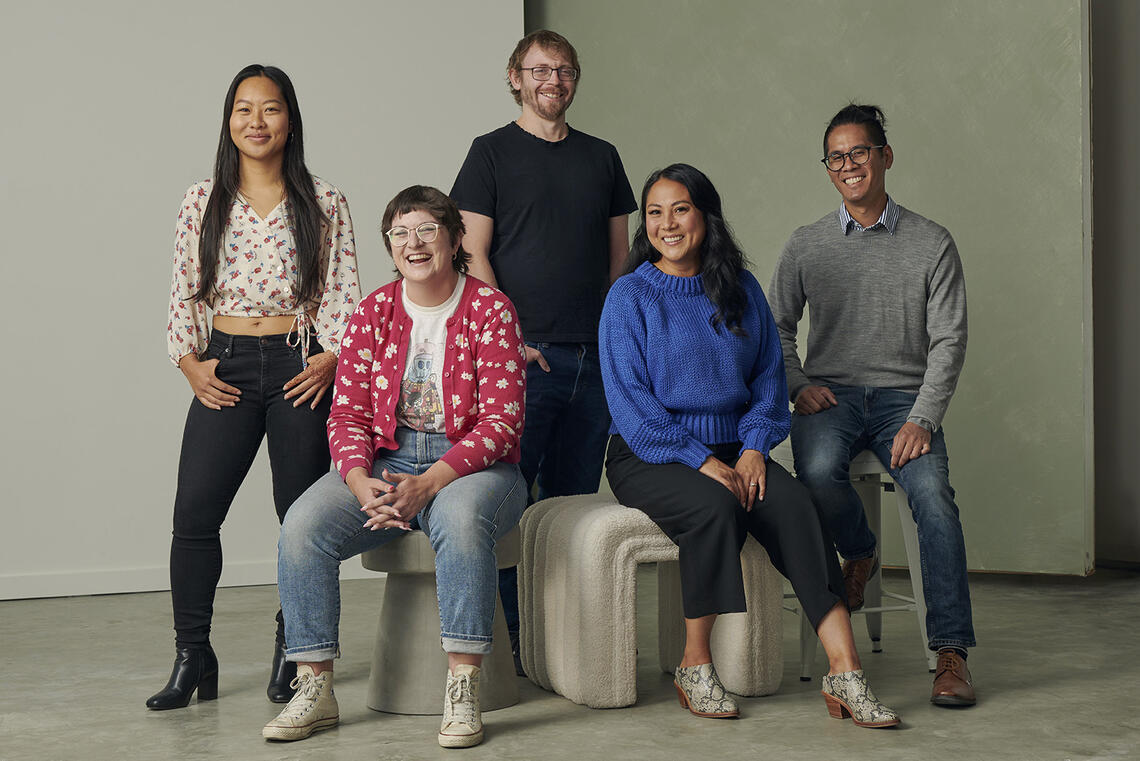 A group of people pose together